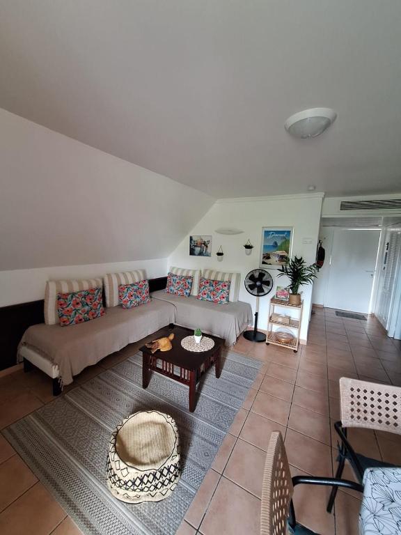 Posezení v ubytování Appartement 2 à 6 personnes dans un magnifique complexe de Vacances à Sainte-Luce