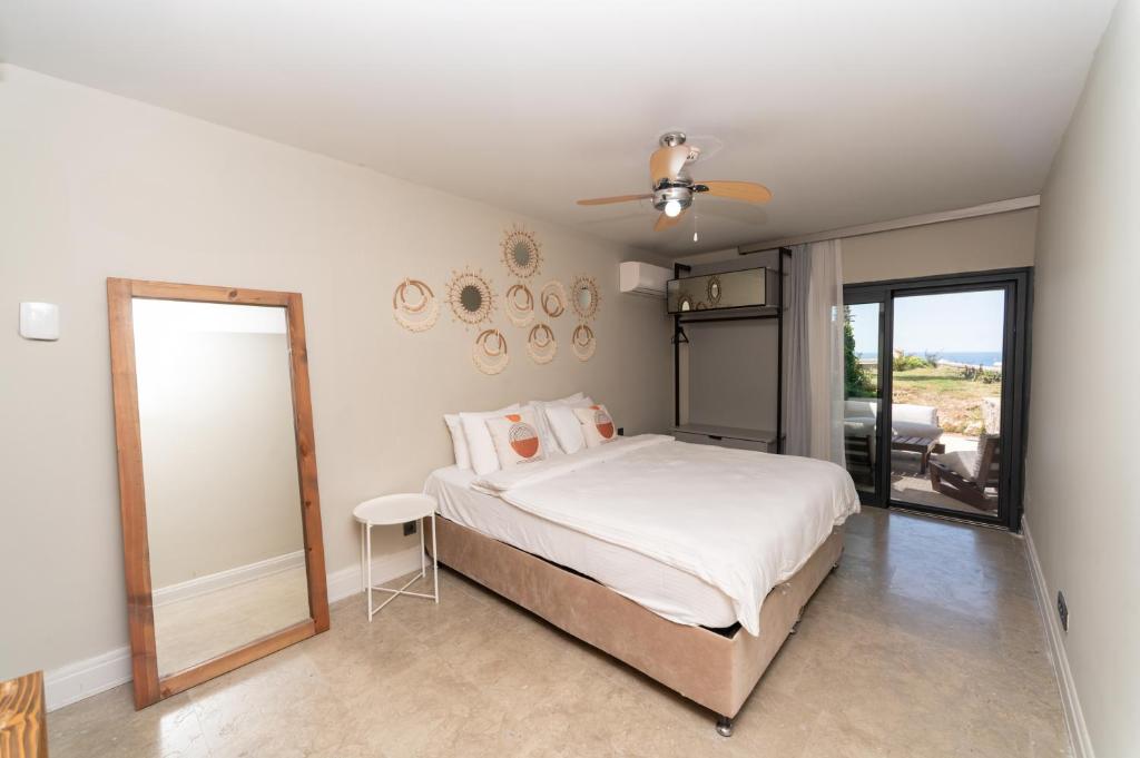 A bed or beds in a room at Vistaport A - Luxury Villa