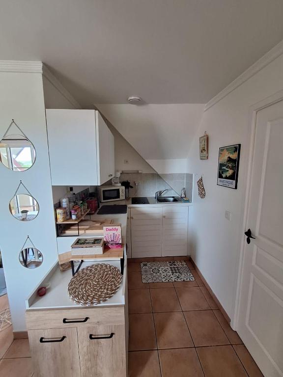Kuchyň nebo kuchyňský kout v ubytování Appartement 2 à 6 personnes dans un magnifique complexe de Vacances à Sainte-Luce