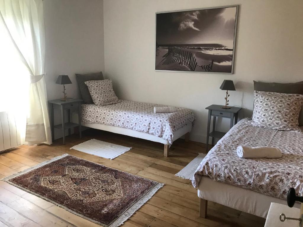 Postel nebo postele na pokoji v ubytování l'Espace Champêtre