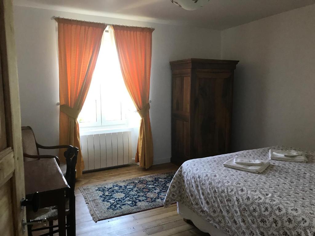 Postel nebo postele na pokoji v ubytování l'Espace Champêtre