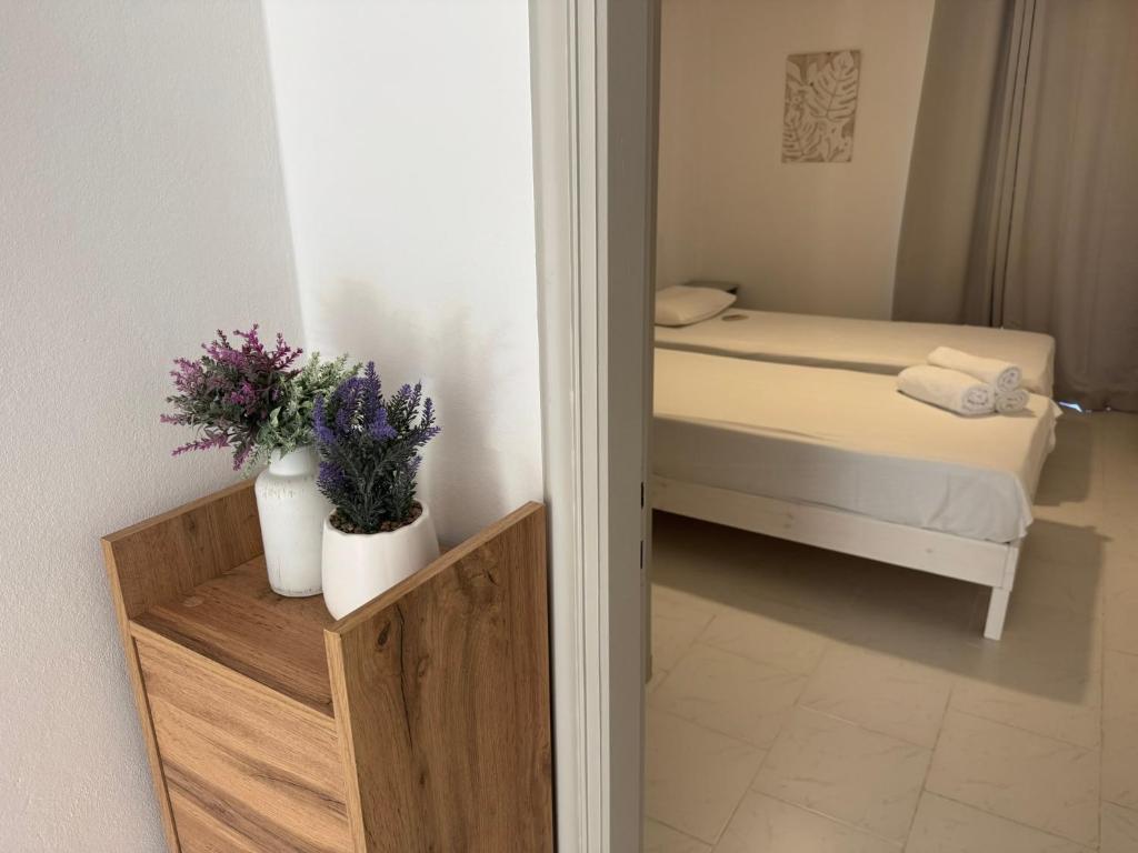Postel nebo postele na pokoji v ubytování Koala Place