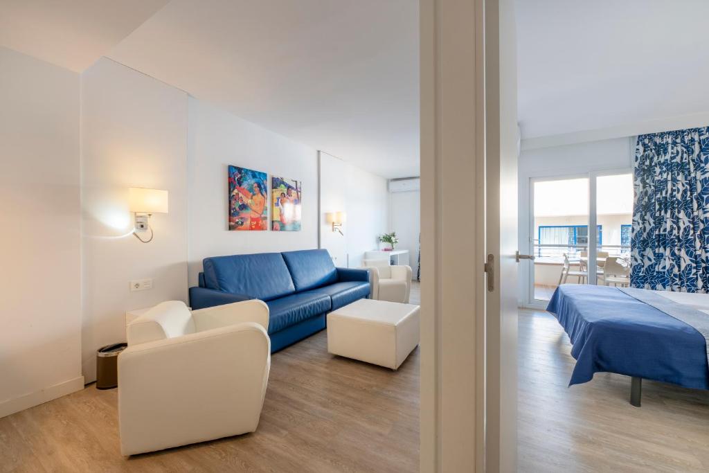 Postel nebo postele na pokoji v ubytování Hotel Tahití Playa