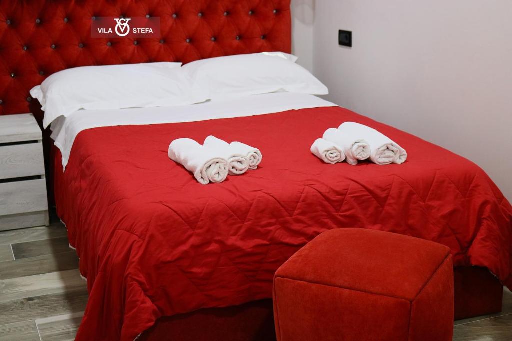 Postel nebo postele na pokoji v ubytování Hotel Vila Stefa