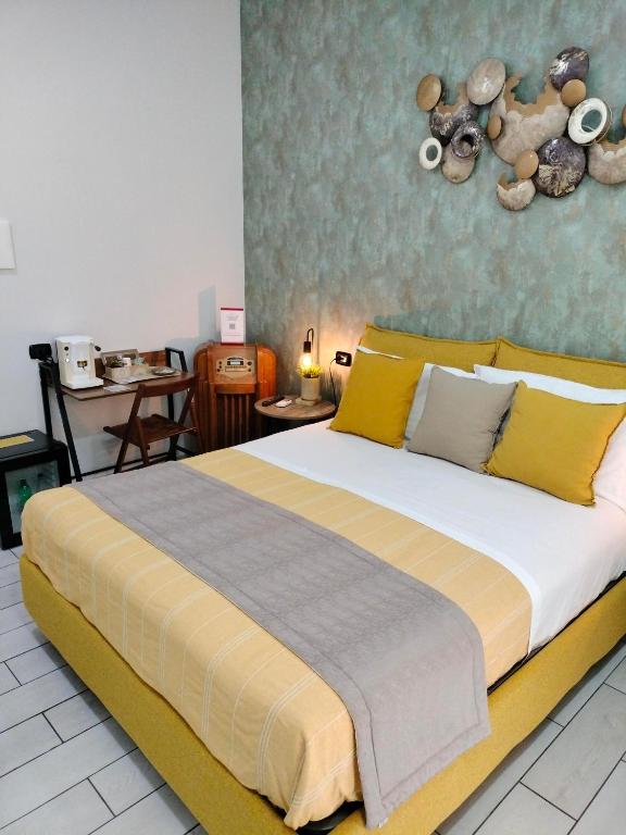 Posteľ alebo postele v izbe v ubytovaní B&B Marcello&Core