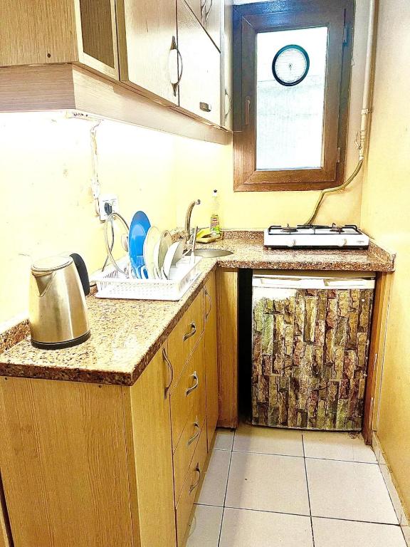 Kuchyň nebo kuchyňský kout v ubytování Taksim White Mansion Hotel