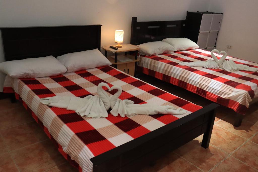 Postel nebo postele na pokoji v ubytování Point Vista Transient Accomodation