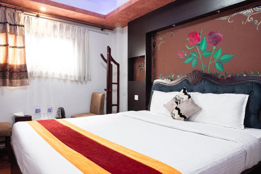 Postel nebo postele na pokoji v ubytování Hotel Kathmandu square