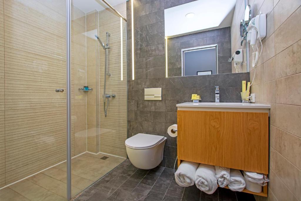 Koupelna v ubytování Cartez Hotel