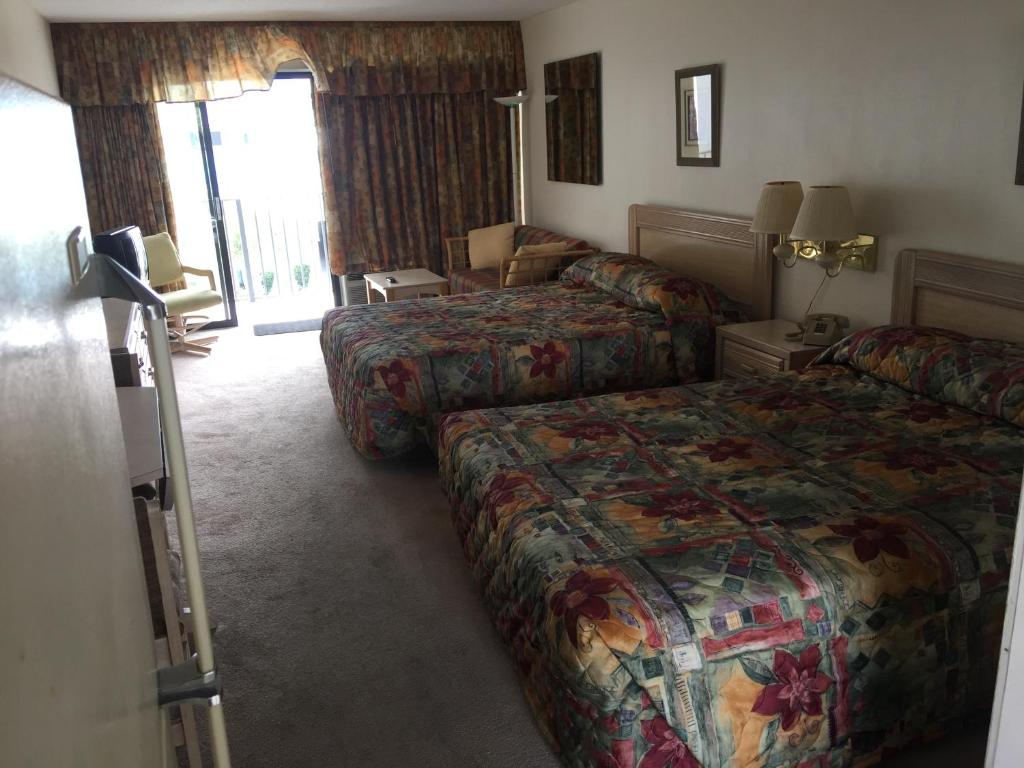 Ein Bett oder Betten in einem Zimmer der Unterkunft David&#39;s Landing