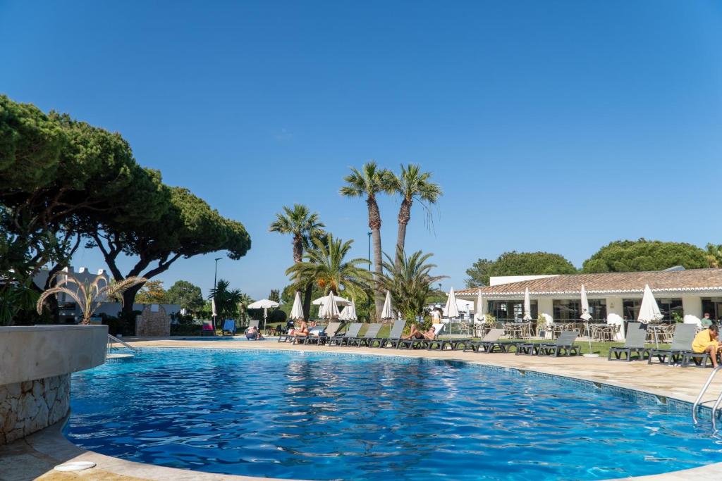 Curated visual reference: Visual Reference: Luxury Garden House Apartment Golf Tennis Court Pools Albufeira