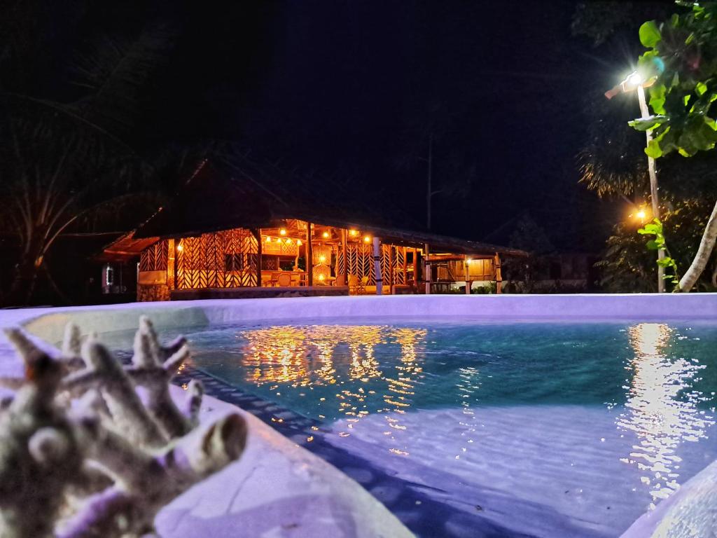 Bazén v ubytování Manoa, boutique Villas and Spa nebo v jeho okolí