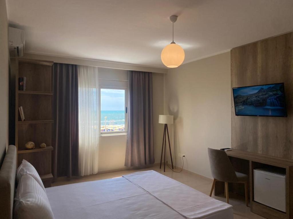 Postel nebo postele na pokoji v ubytování Rumar Hotel