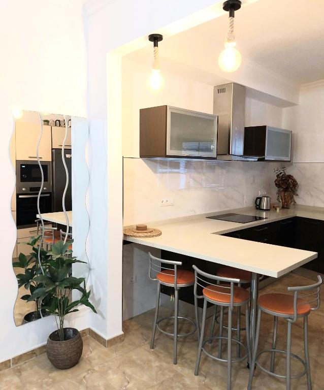 Kuchyň nebo kuchyňský kout v ubytování Roque's House