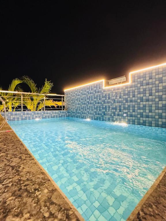 Bazén v ubytování Hotel Aana Inn Prime Swiming Pool nebo v jeho okolí
