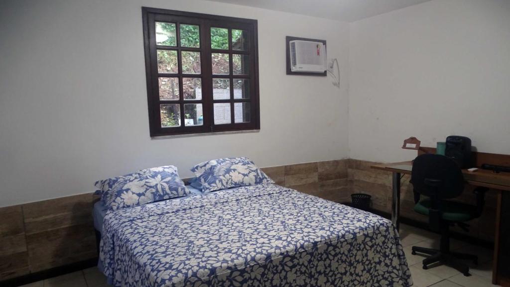 Postel nebo postele na pokoji v ubytování Quarto em casa na Mata Atlântica
