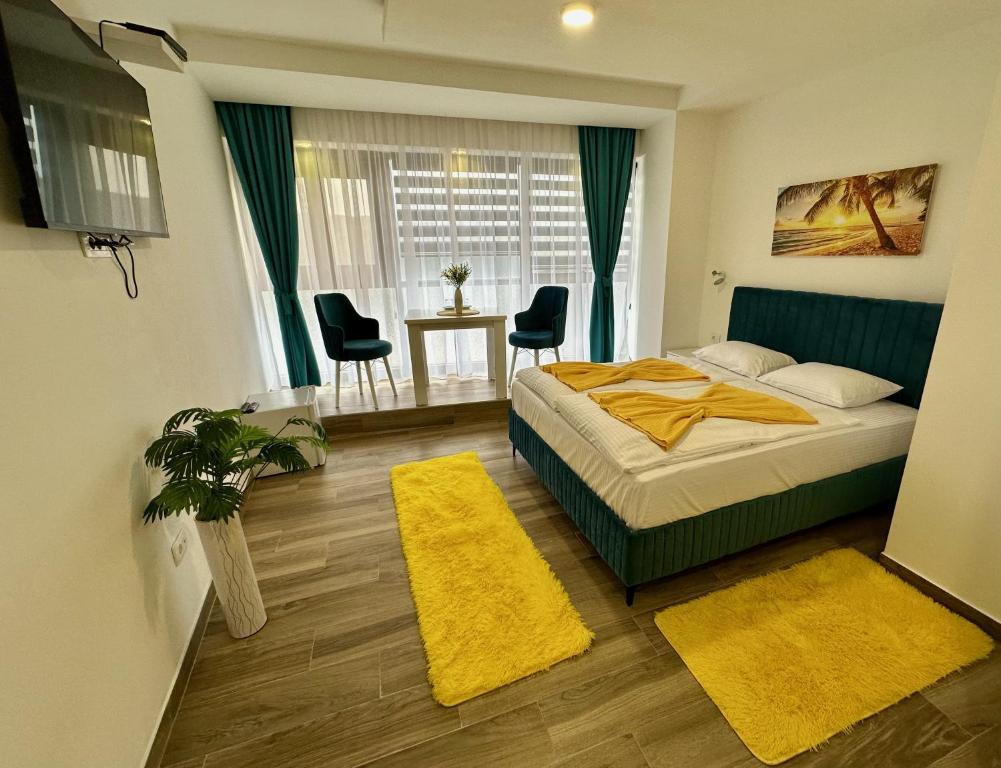 Postel nebo postele na pokoji v ubytování Kangaroo Apartmani