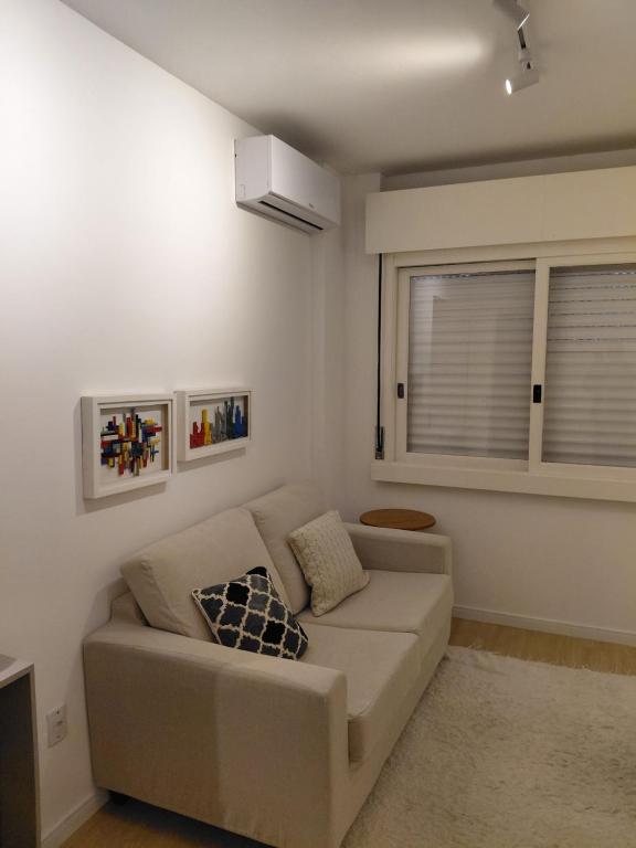 Χώρος καθιστικού στο Moderno e alegre
