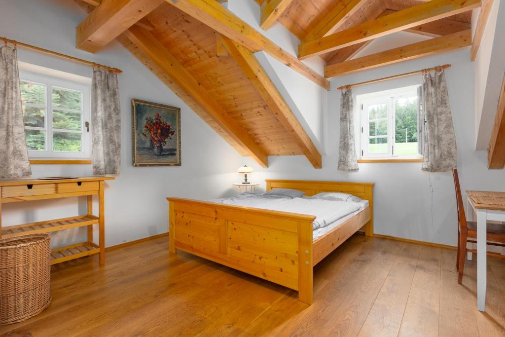 Posteľ alebo postele v izbe v ubytovaní Apartmány U Šakala