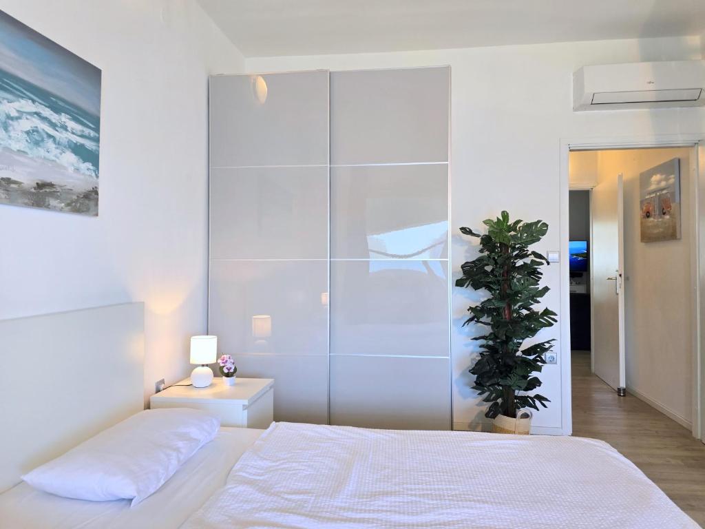Posteľ alebo postele v izbe v ubytovaní Apartment Villa Bralo