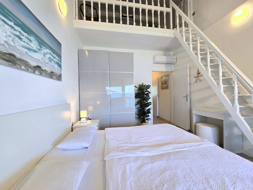 Posteľ alebo postele v izbe v ubytovaní Apartment Villa Bralo