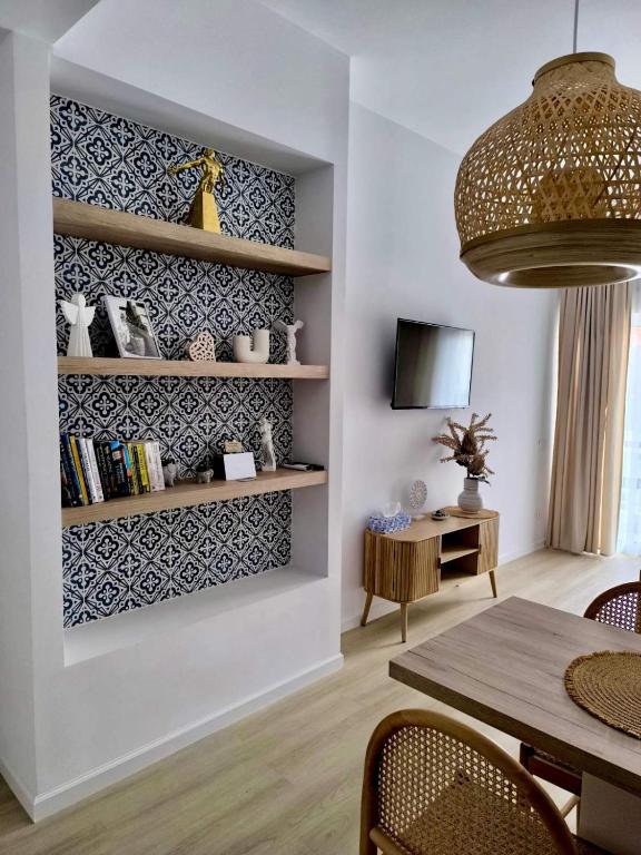 TV a/nebo společenská místnost v ubytování Sunrise condo