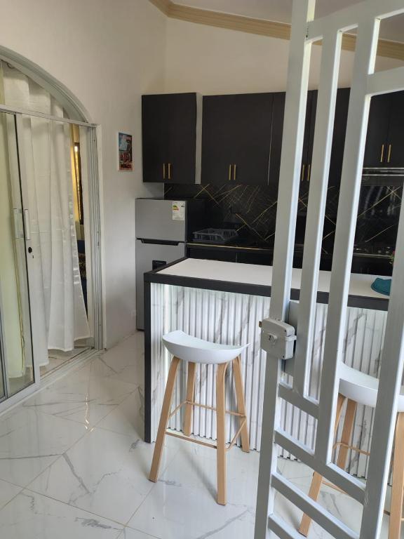 Kuchyň nebo kuchyňský kout v ubytování las flores hostal