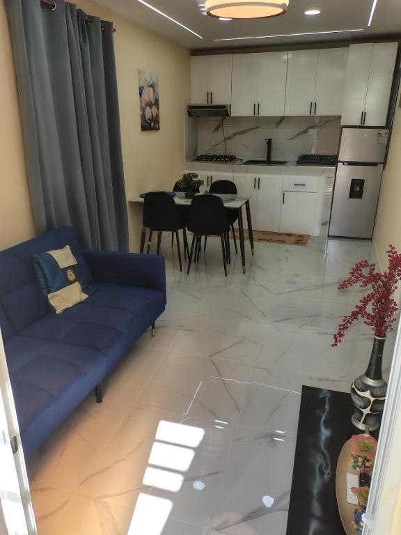 Kuchyň nebo kuchyňský kout v ubytování las flores hostal
