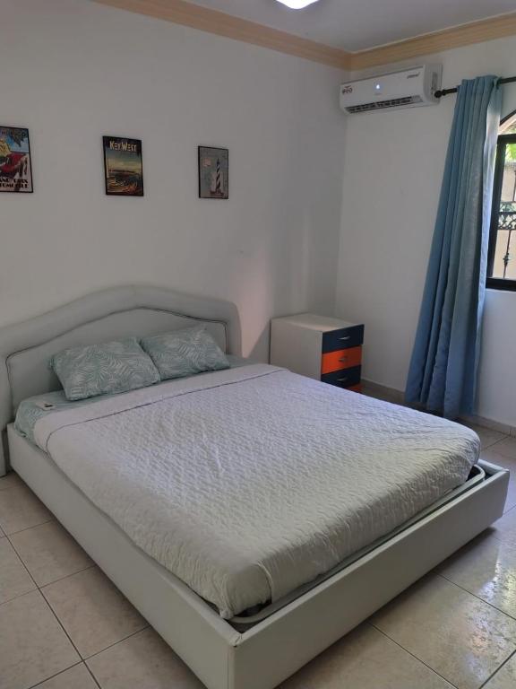 Postel nebo postele na pokoji v ubytování las flores hostal