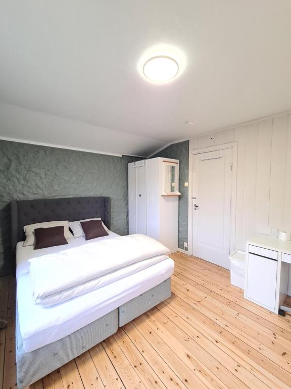 En eller flere senger på et rom på DT Serene Villa - Lillestrøm