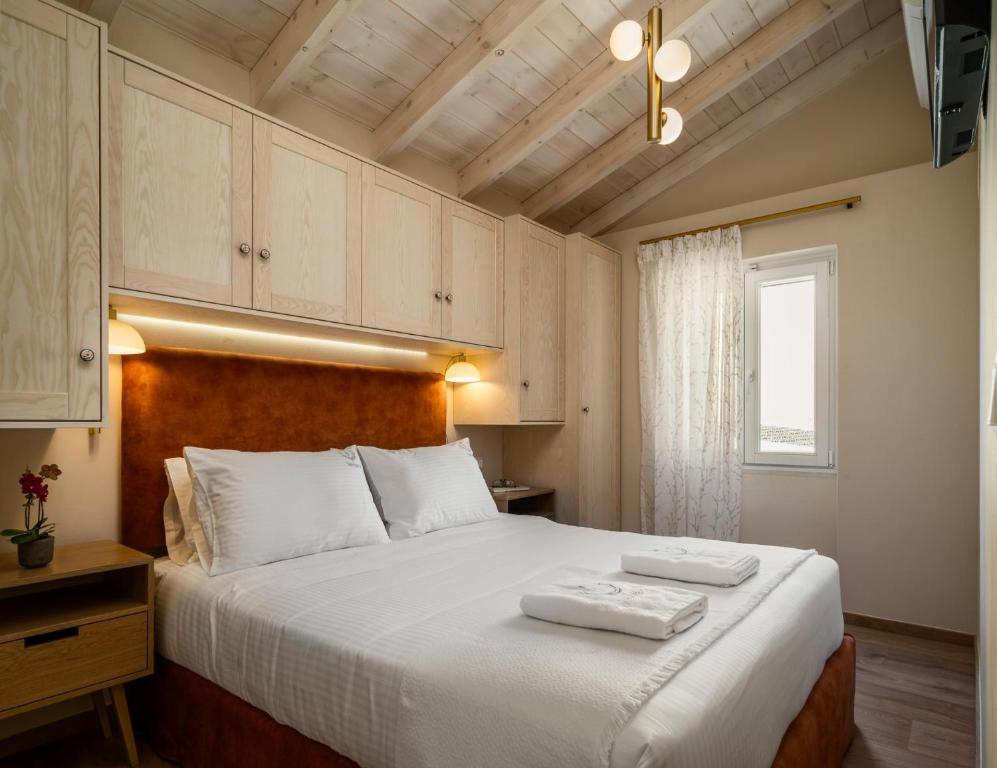 Postel nebo postele na pokoji v ubytování Navigator Luxury Town House