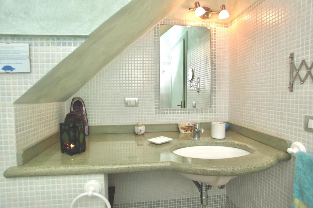 Koupelna v ubytování Alba B&B