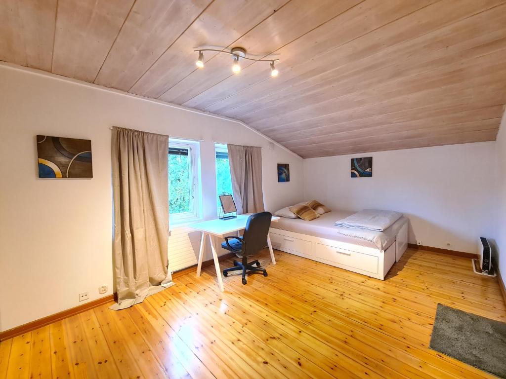 En eller flere senger på et rom på DT Serene Villa - Lillestrøm