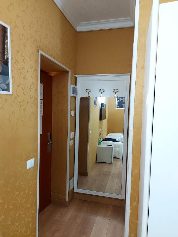 Postel nebo postele na pokoji v ubytování Hotel Positano 2 MIMOSA