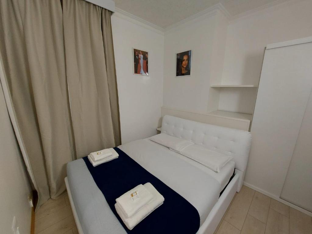 Postel nebo postele na pokoji v ubytování Hotel Positano 2 MIMOSA