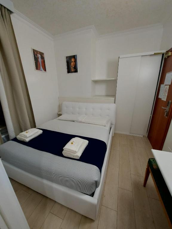 Postel nebo postele na pokoji v ubytování Hotel Positano 2 MIMOSA