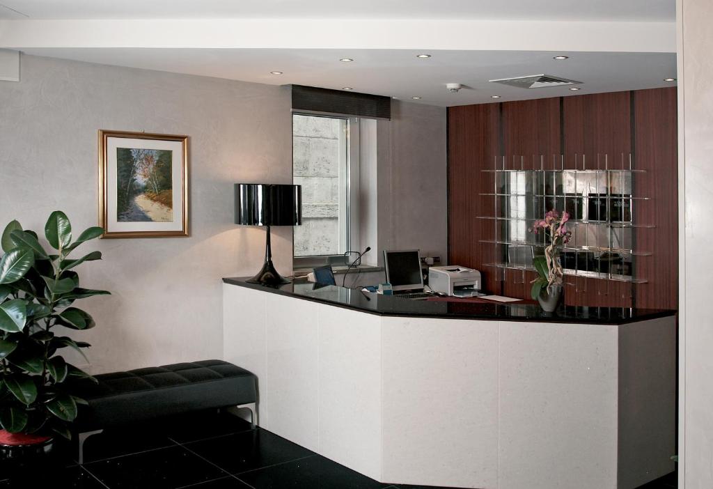 an office with a counter with a desk at Victoria Hotel in Pescara