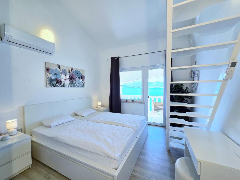 Posteľ alebo postele v izbe v ubytovaní Apartment Villa Bralo