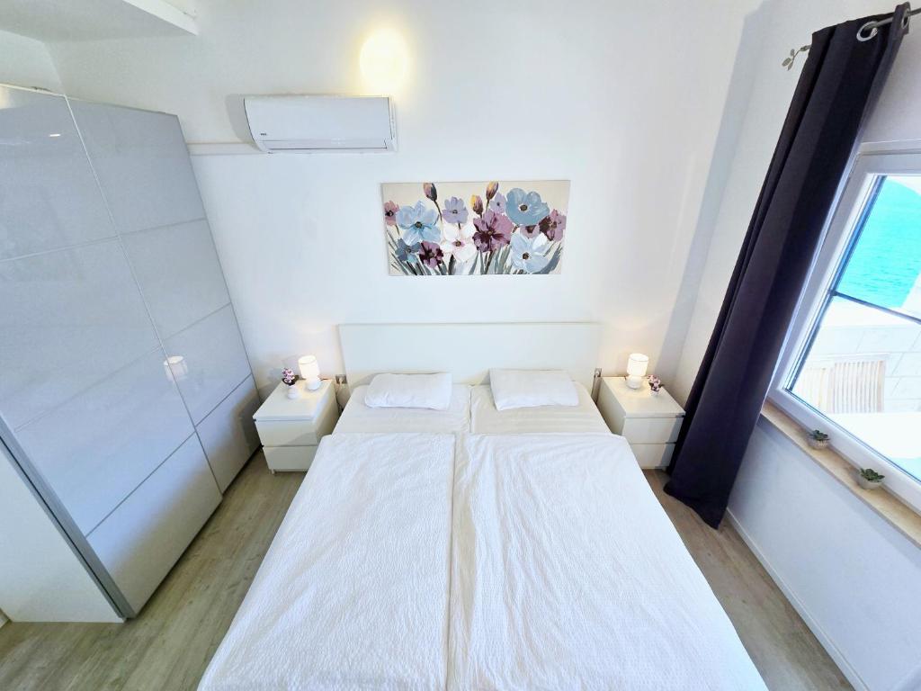 Posteľ alebo postele v izbe v ubytovaní Apartment Villa Bralo