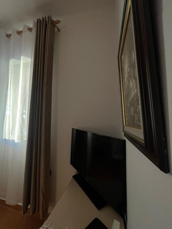 TV a/nebo společenská místnost v ubytování TE SHPIA
