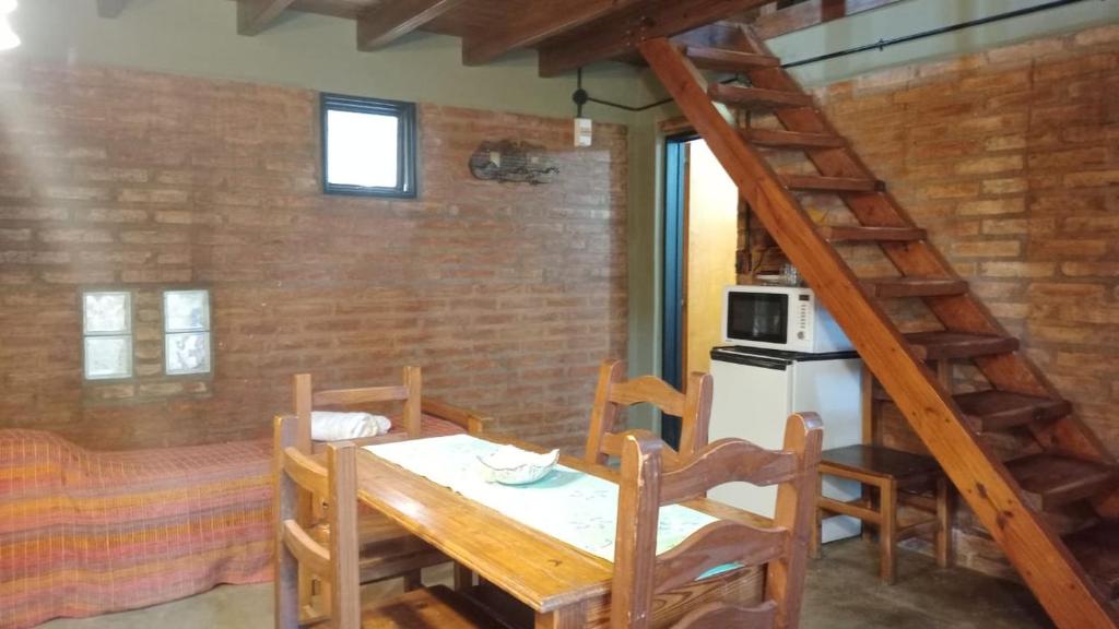 TV a/nebo společenská místnost v ubytování el refugio piramides