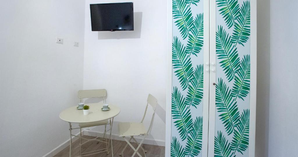 TV a/nebo společenská místnost v ubytování Le Pigne - Mare e Relax