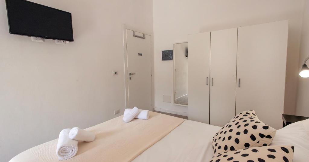 Postel nebo postele na pokoji v ubytování Le Pigne - Mare e Relax