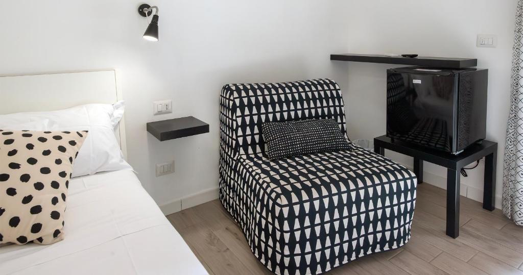 TV a/nebo společenská místnost v ubytování Le Pigne - Mare e Relax