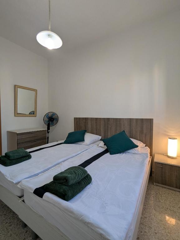 Postel nebo postele na pokoji v ubytování Fly Dodo Summer Residence