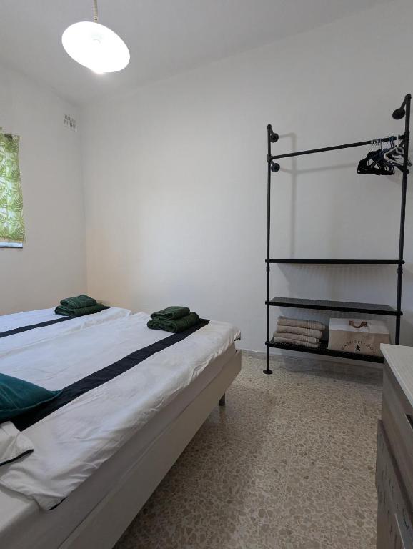 Postel nebo postele na pokoji v ubytování Fly Dodo Summer Residence