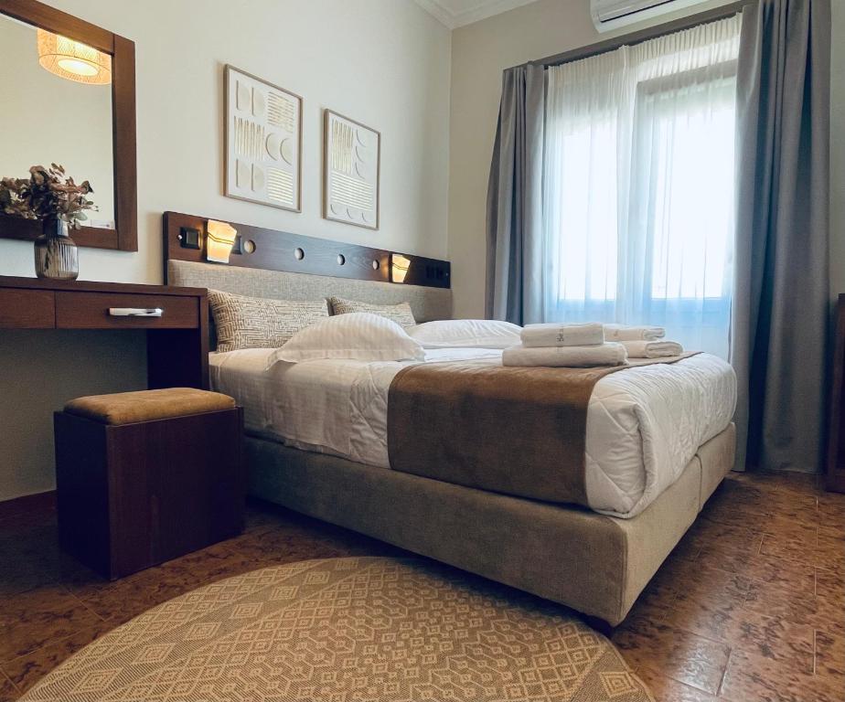 Postel nebo postele na pokoji v ubytování Semiramis Guesthouse