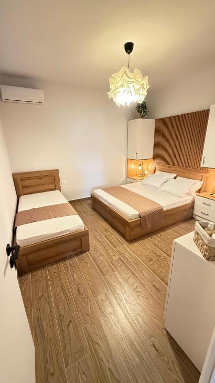 Postel nebo postele na pokoji v ubytování EllinFos Apartments