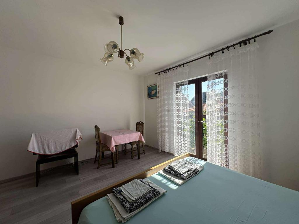 Postel nebo postele na pokoji v ubytování Apartment Marija 2