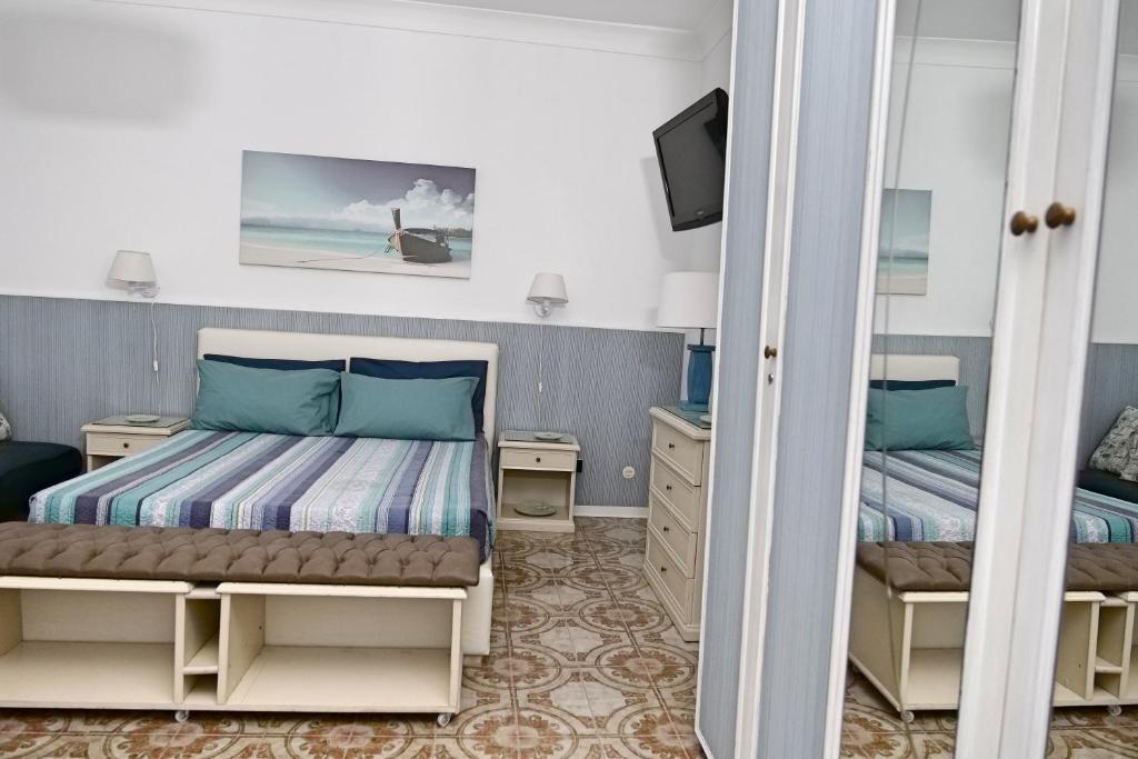 A bed or beds in a room at Villa Gisella